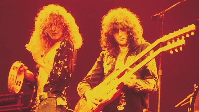 1970s photo of singer Robert Plant (Left) & guitarist Jimmy Page from band Led Zeppelin. 