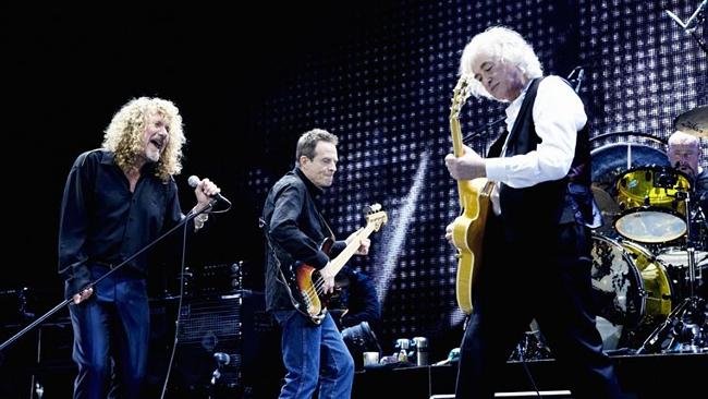 Led Zeppelin on stage at the O2 Arena: Robert Plant, John Paul Jones and Jimmy Page.