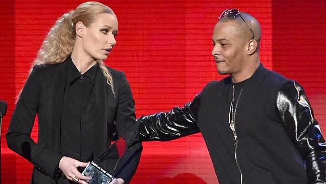 Iggy Azalea, pictured with rapper T.I. at the American Music Awards, is tipped to win big
