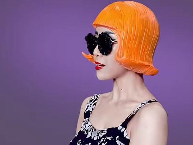 An orange plastic wig helmet. We’re not sure why.