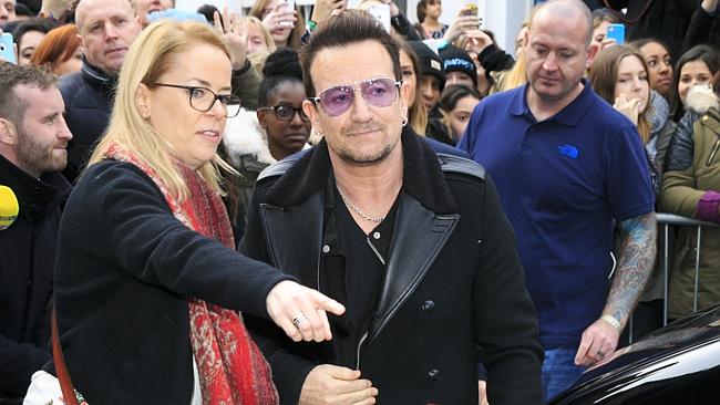 The day before ... Bono arrives in London to record the Band Aid 30 charity single on Nov
