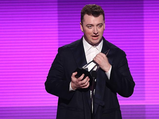Honest ... Sam Smith accepts the award for favourite pop/rock male artist on stage at the