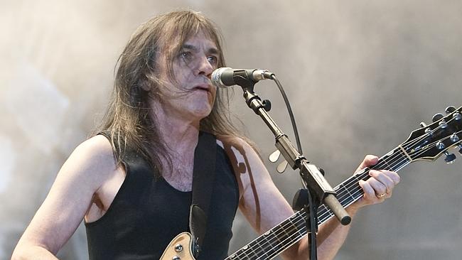 Dementia ... Malcolm Young on stage during AC/DC’s Black Ice Tour. Picture: Charles Brewe