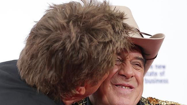 The Hair meets the Hat — Richard Wilkins is following the fake Molly on Twitter. (Photo b