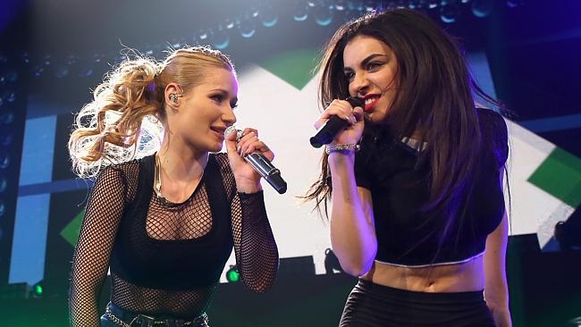 Fancy that ... Iggy Azalea (L) and Charli XCX perform their hit. Picture: Getty