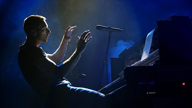 Chris Martin from Coldplay catches another song from the ether. Picture: Richard Dobson