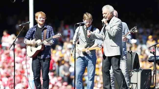 Ed Sheeran and Sir Tom Jones perform at the 2014 AFL Grand Final. Picture: David Caird