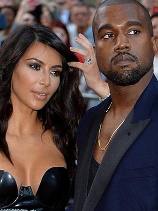 Mr Kardashian ... Kanye West and his wife, Kim. Picture: Getty