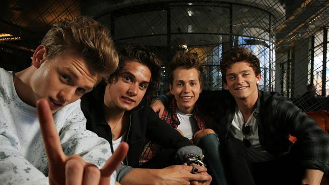 Hiding out ... The Vamps hanging out at their Sydney record label offices while fans wait