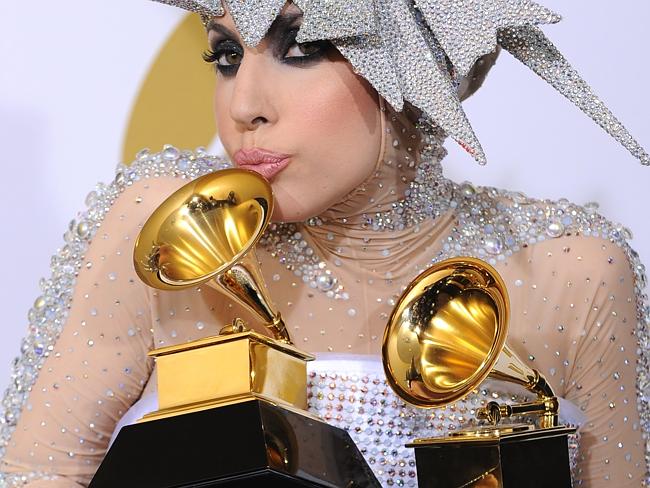Grammys for Gaga ... Lady Gaga poses backstage with her awards for Best Dance Recording a