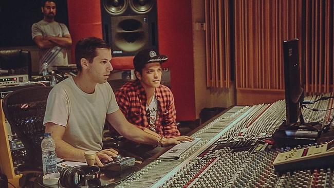 Producer Mark Ronson and Bruno Mars in the recording studio. Picture: Supplied