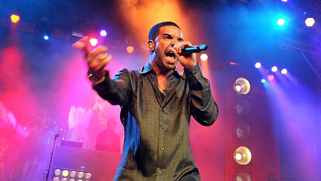 Come on down! ... Rapper Drake has finally been tempted to tour Australia.