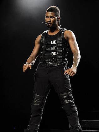 Bicep bulge ... Usher stays in shape for the stage. Picture: News Corp Australia.