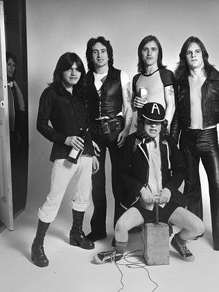 Mother hen ... Riccobono checks on her charges AC/DC during a photo shoot. Picture: Suppl