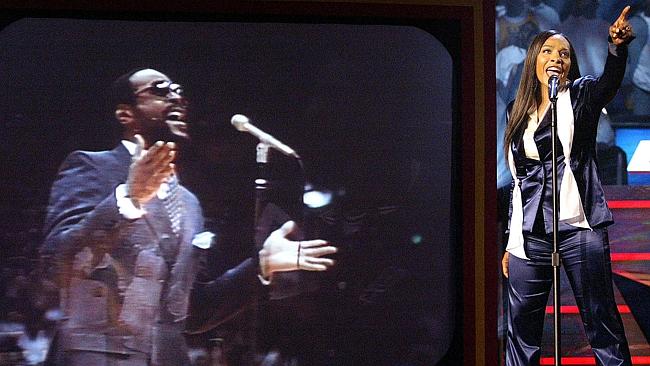 Nona Gaye, daughter of singer Marvin Gaye, sings the National Anthem during the 2004 NBA 