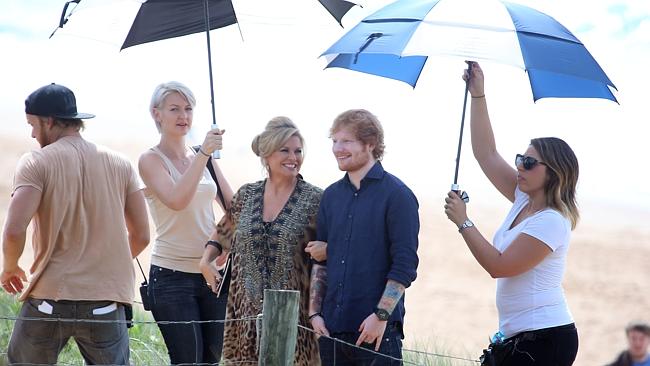Superstar cameo ... Ed Sheeran and Emily Symons filming at Palm Beach. Picture: Andrew Mu