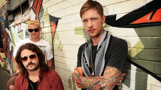 John’s boy ... Rival Fire, fronted by the heavily tattooed Rob Farnham, are ready to Riot