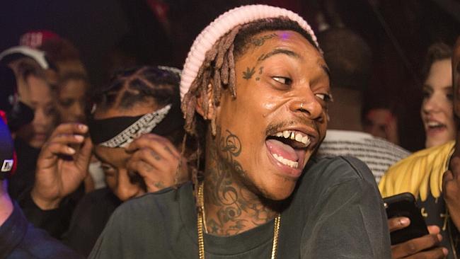 Wiz Khalifa was probably not listening to Taylor Swift at this party.