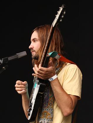 Mansplaining a few things. Kevin Parker of Tame Impala performs live for fans at the 2014