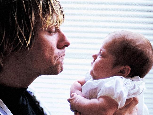Love ... Cobain with baby daughter Frances Bean in California 1992. Picture: Supplied