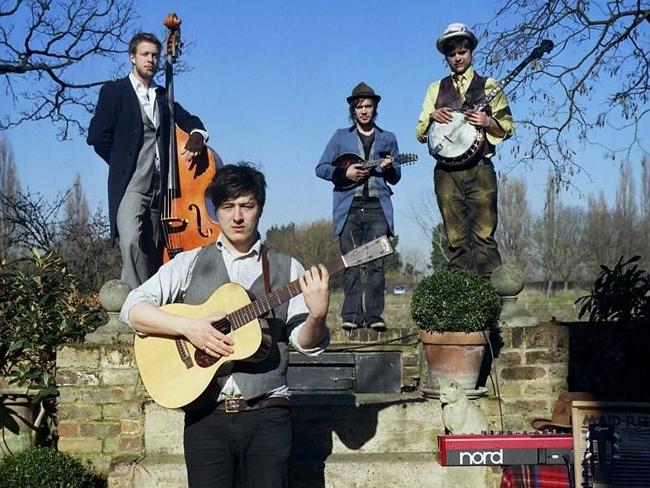 The ye old days ... Mumford & Sons rocking their vintage threads and instruments. Picture