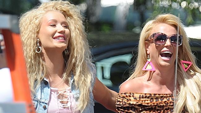 Britney Spears and Iggy Azalea share a laugh on set of their new music video in Los Angel