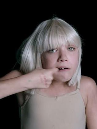 The 12-year-old performs alone in the clip.