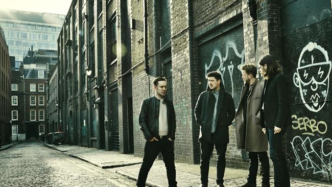 New look ... Banjos out, electric guitars and graffiti in for the reborn Mumford & Sons. 