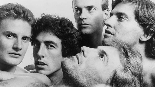 Boys light up ... Australian Crawl, with frontman James Reyne having a lie down, in 1980.
