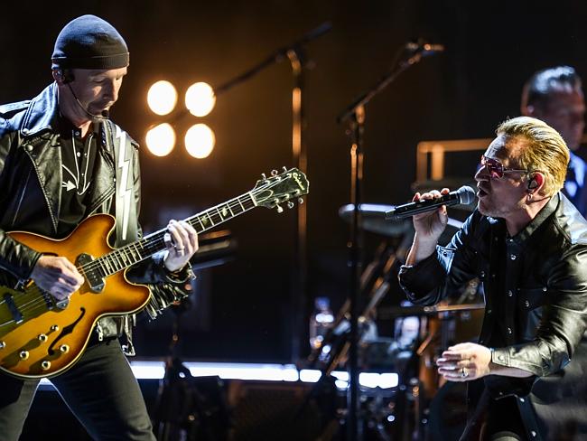 ‘We’ve lost a family member’ ... The Edge, left, and Bono of U2 perform at the Innocence 