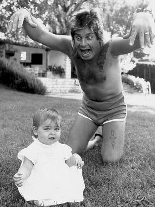 Ozzy Osbourne with daughter Aimee, 1984.