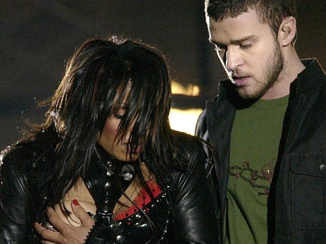 Wardrobe malfunction ... Janet Jackson (l) covers her breast after her outfit came undone