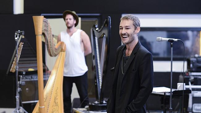 Band leader ... Daniel Johns rehearsing for his first solo concerts in a Sydney studio la