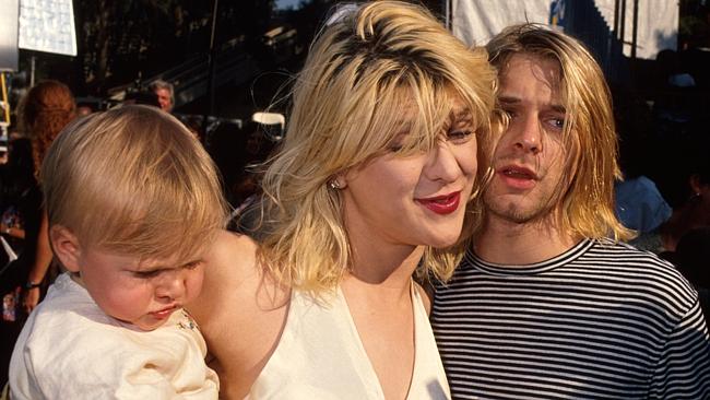 Courtney Love and Kurt Cobain wither their daughter Frances Bean.