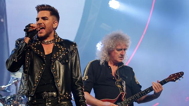 Dragon attack ... Brian May guests with new mate Adam Lambert on his new album. Picture: 