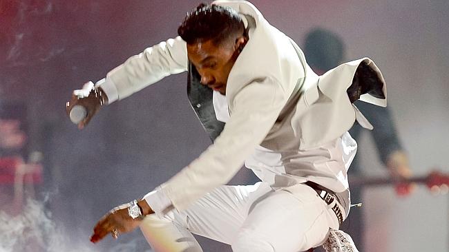 Dangerous jump ... Miguel mid-flight at the Billboard Awards. Picture: Getty