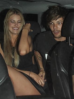 Louis Tomlinson and Briana Jungwirth enjoy a late night out in Hollywood.
