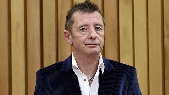 Detention ... Phil Rudd has been arrested at his home.