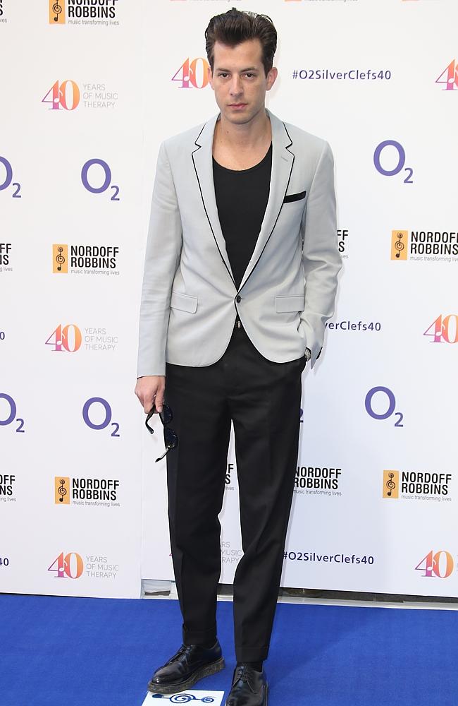Mark Ronson on the blue carpet in London in July, 2015. (Photo by Joel Ryan/Invision/AP)