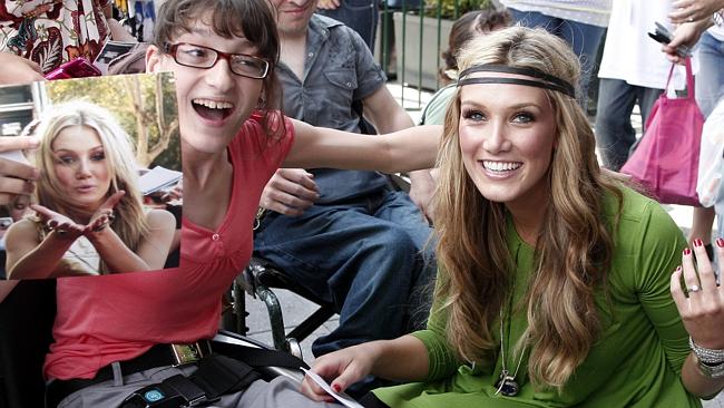 People person ... Delta Goodrem meets fan Rosanna Deidda in Sydney during one of her many