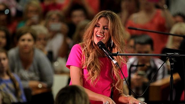 Singer and judge on 'The Voice' TV show, Delta Goodrem sings her new single to fans at th